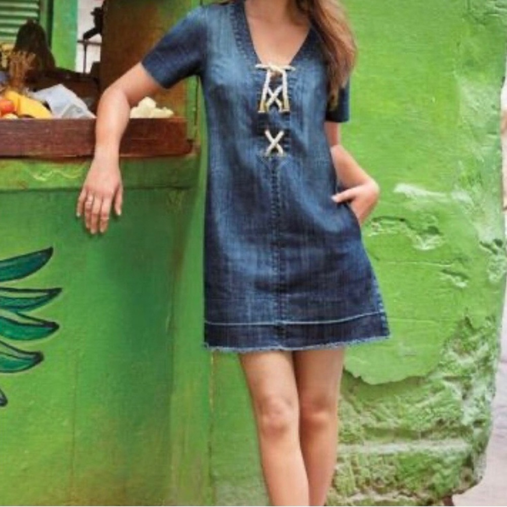 Mark Women’s Havana denim dress with rope lace up front and side pockets.
